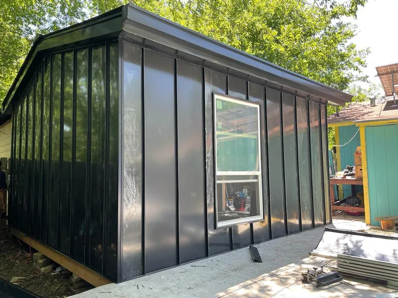 Black standing seam metal wall panels for Roof Inspection in Weatherford