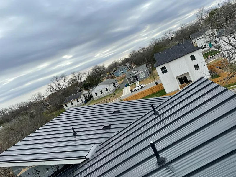 Standing seam metal roof panels with vents for Skylight Repair in Weatherford